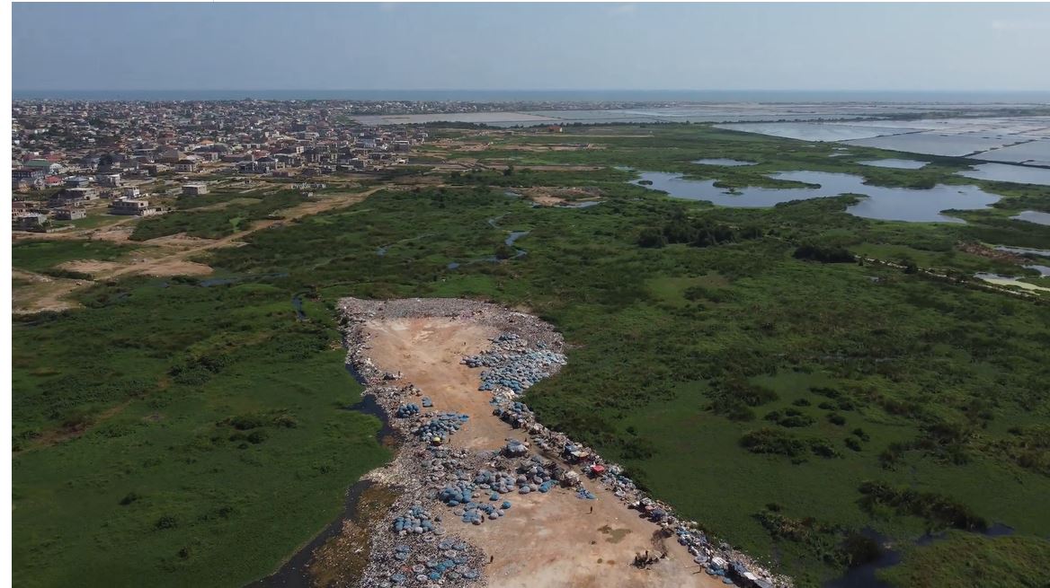 An investigation by Unearthed and Greenpeace Africa found an area of protected wetland cleared of vegetation and used as a textile dump