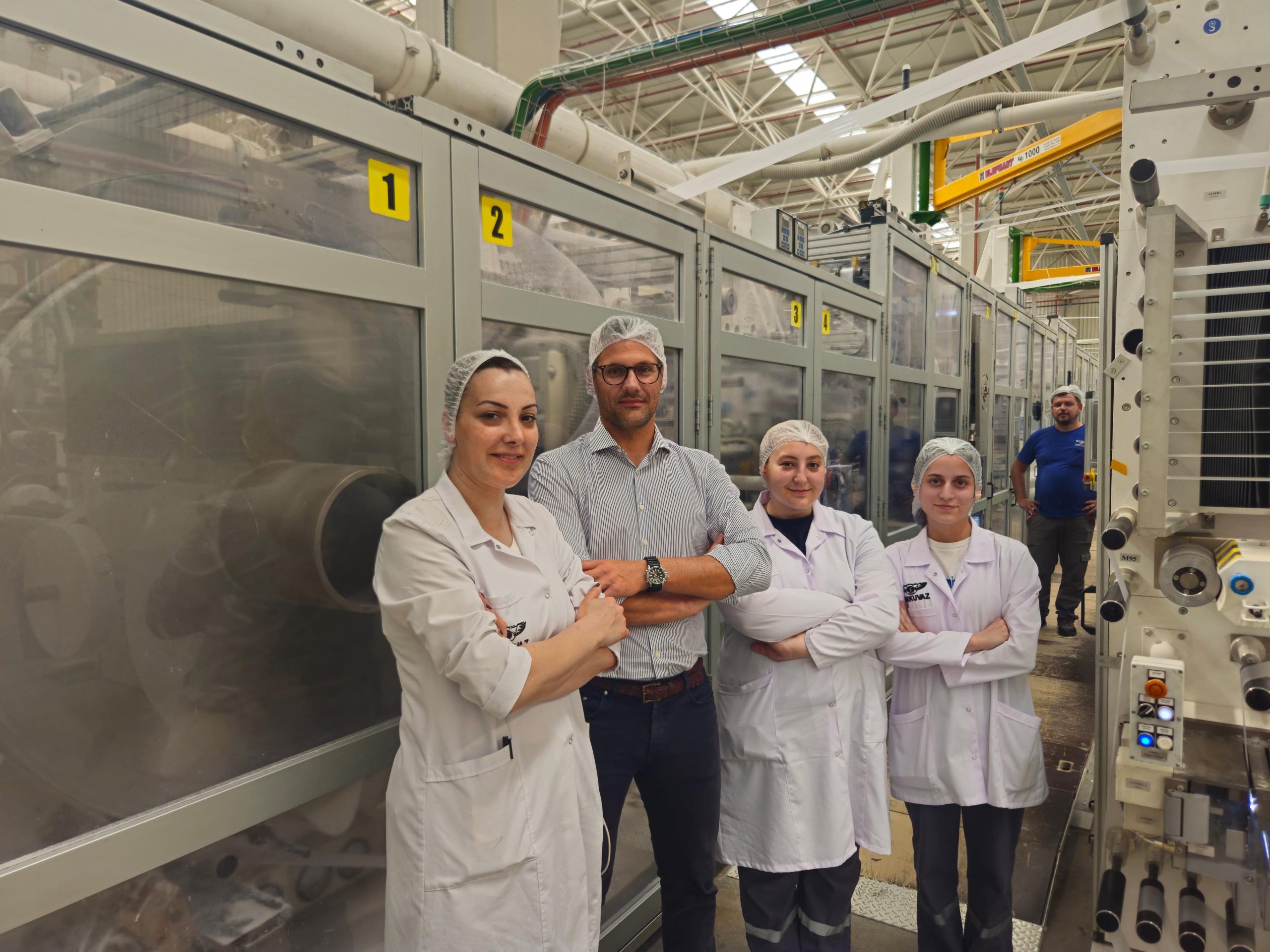 turkuvaz-quality-control-team-and-andritz-service-manager-at-one-of-the-upgraded-converting-lines-copyright-andritz-data.jpg